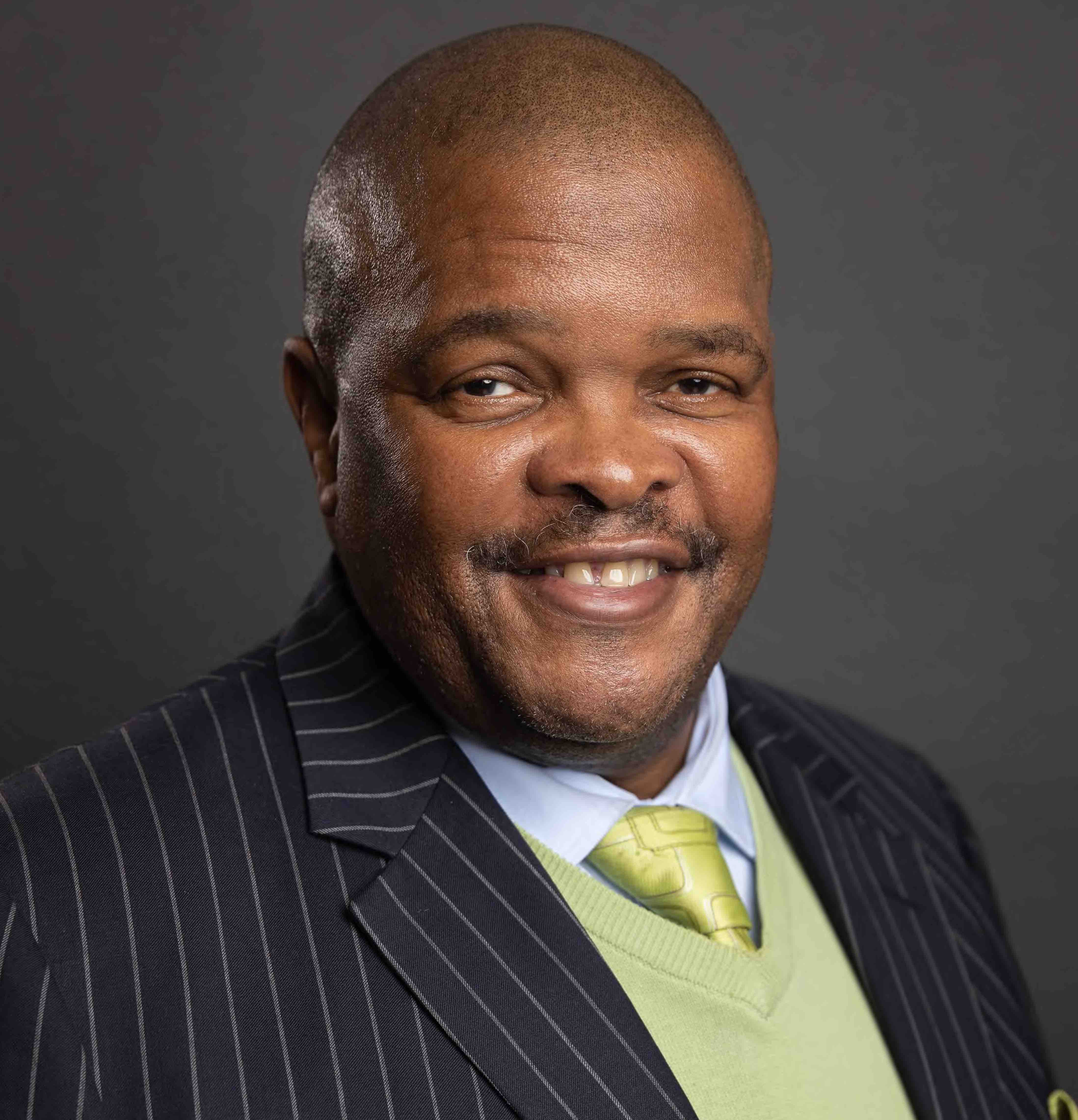 Mr. Andile Qodashe